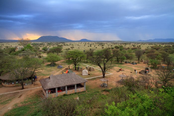 Safari camp in the Serengeti, with storm moving in