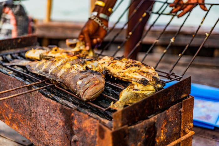 Freshly caught seafood being grilled on the barbecue
