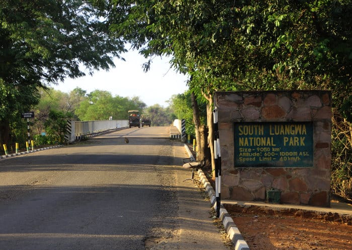 The entrance gate to South Luangwa National Park, with Luangwa bridge in the background